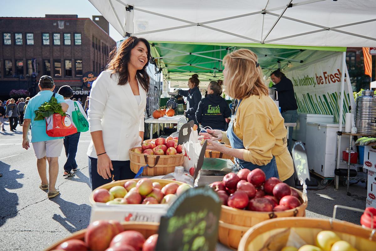 Tulsi at a farmers market